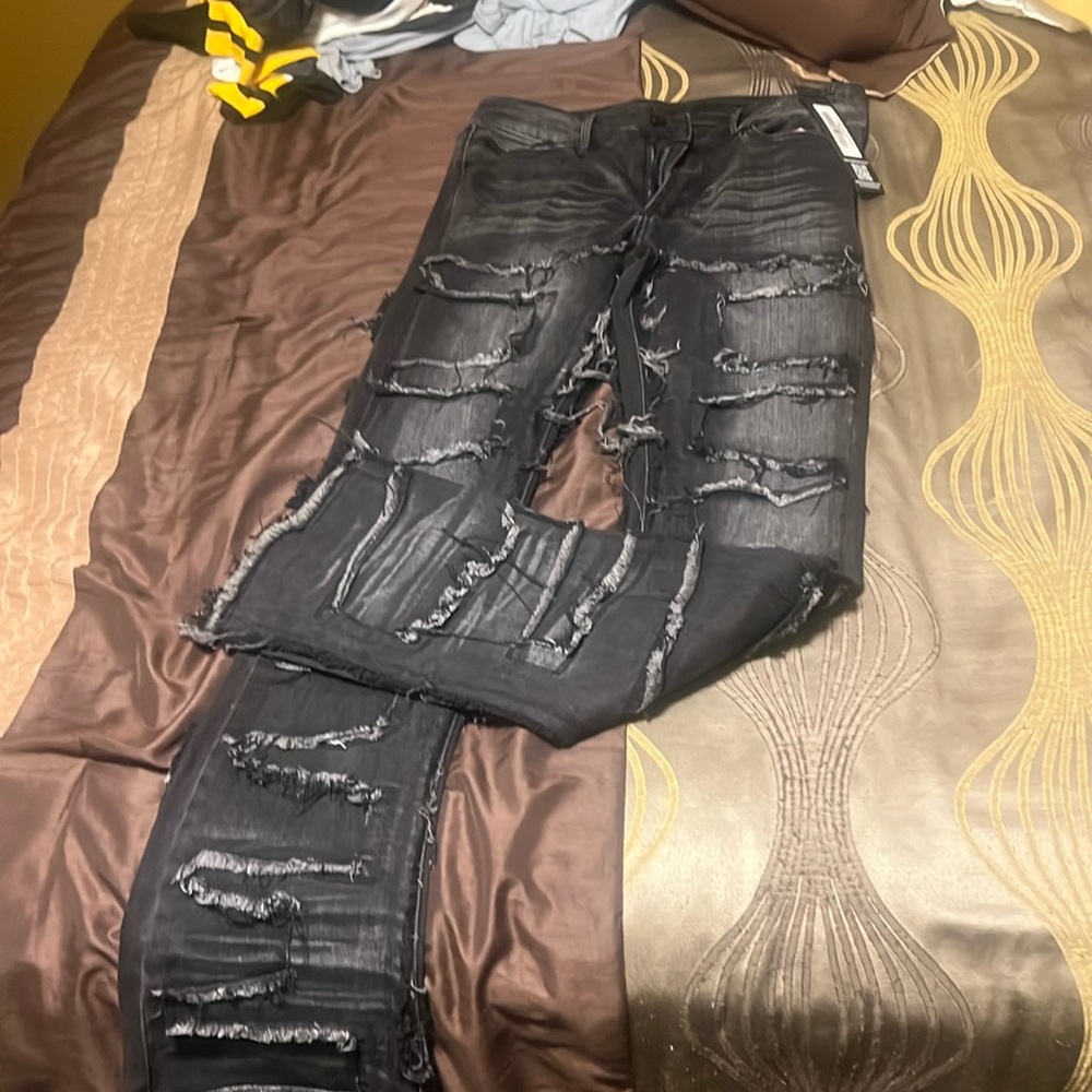 Rockstar dark grey stacked jeans.